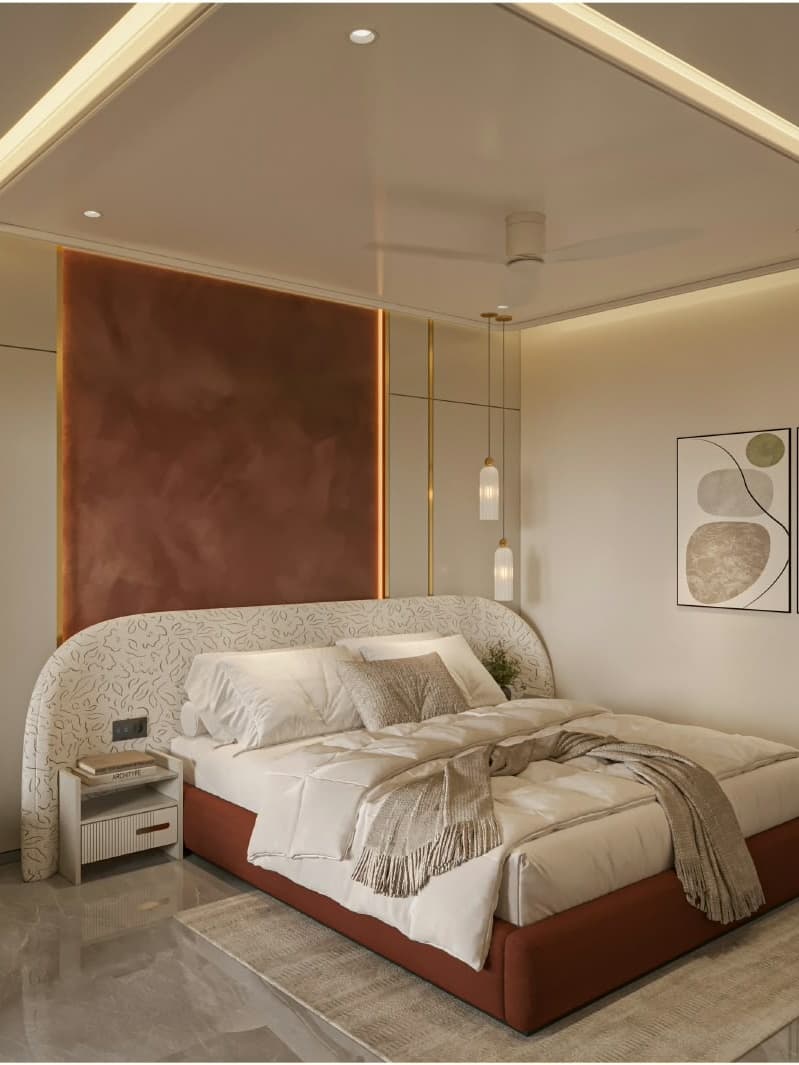 Luxurious bedroom accented by a textured maroon feature wall, curved headboard, and pendant drop lighting.