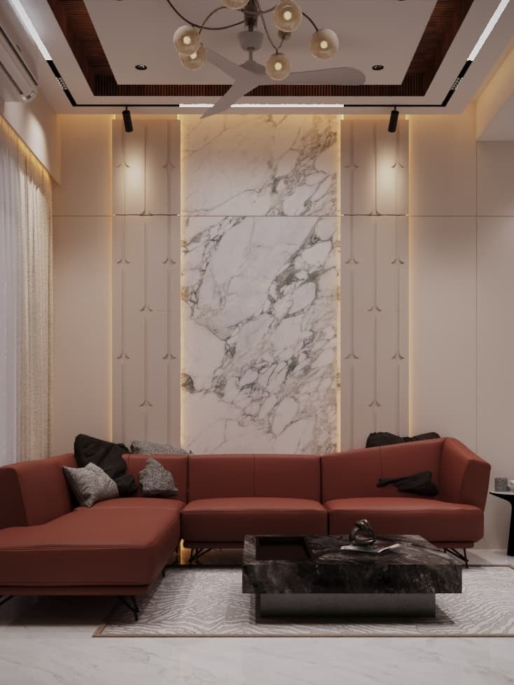 Elegant living lounge framed by a bookmatched Italian marble wall, rust-toned sectional sofa, and recessed ceiling coves.