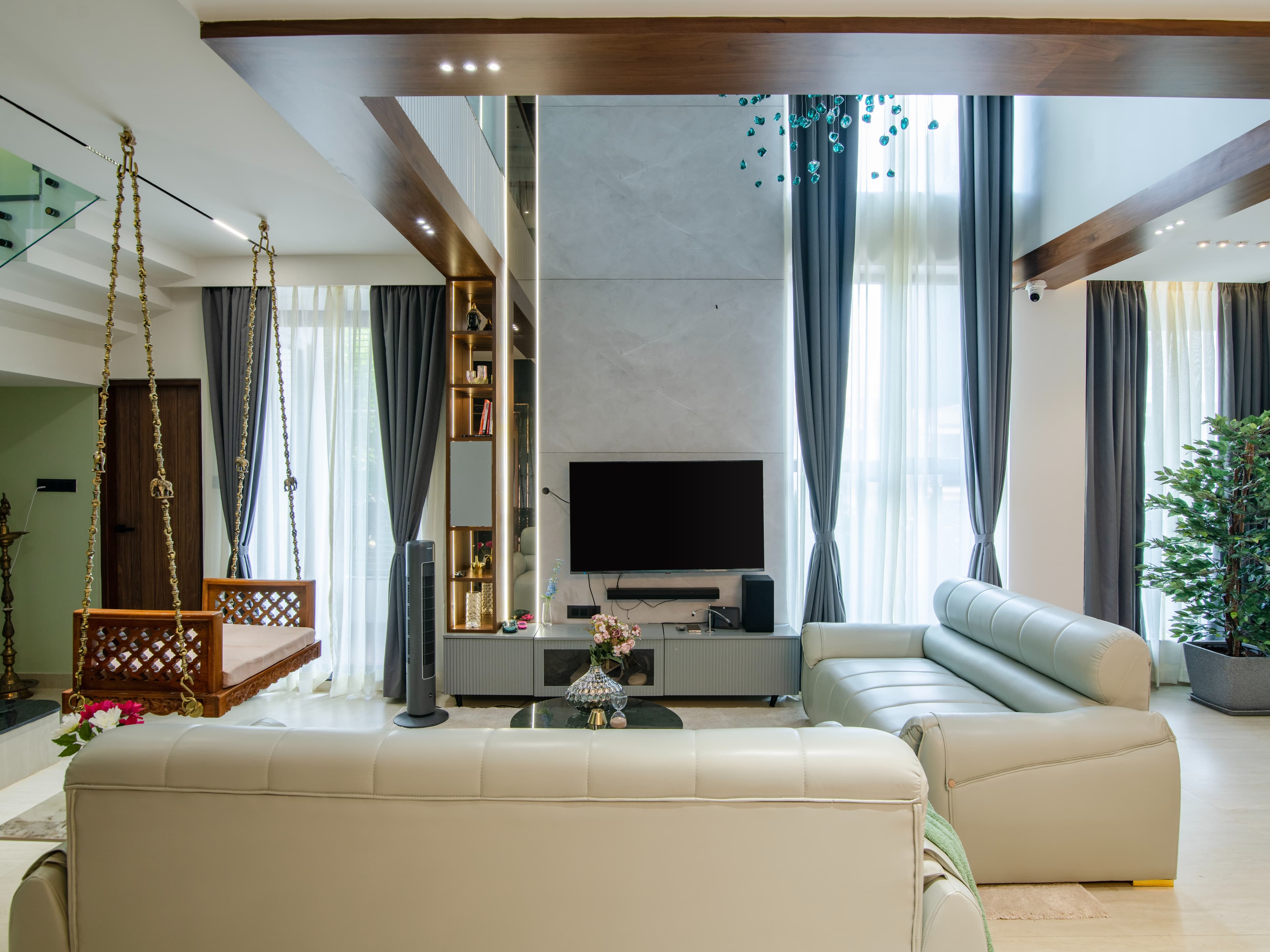 A grand double-height living space that enhances openness and natural light