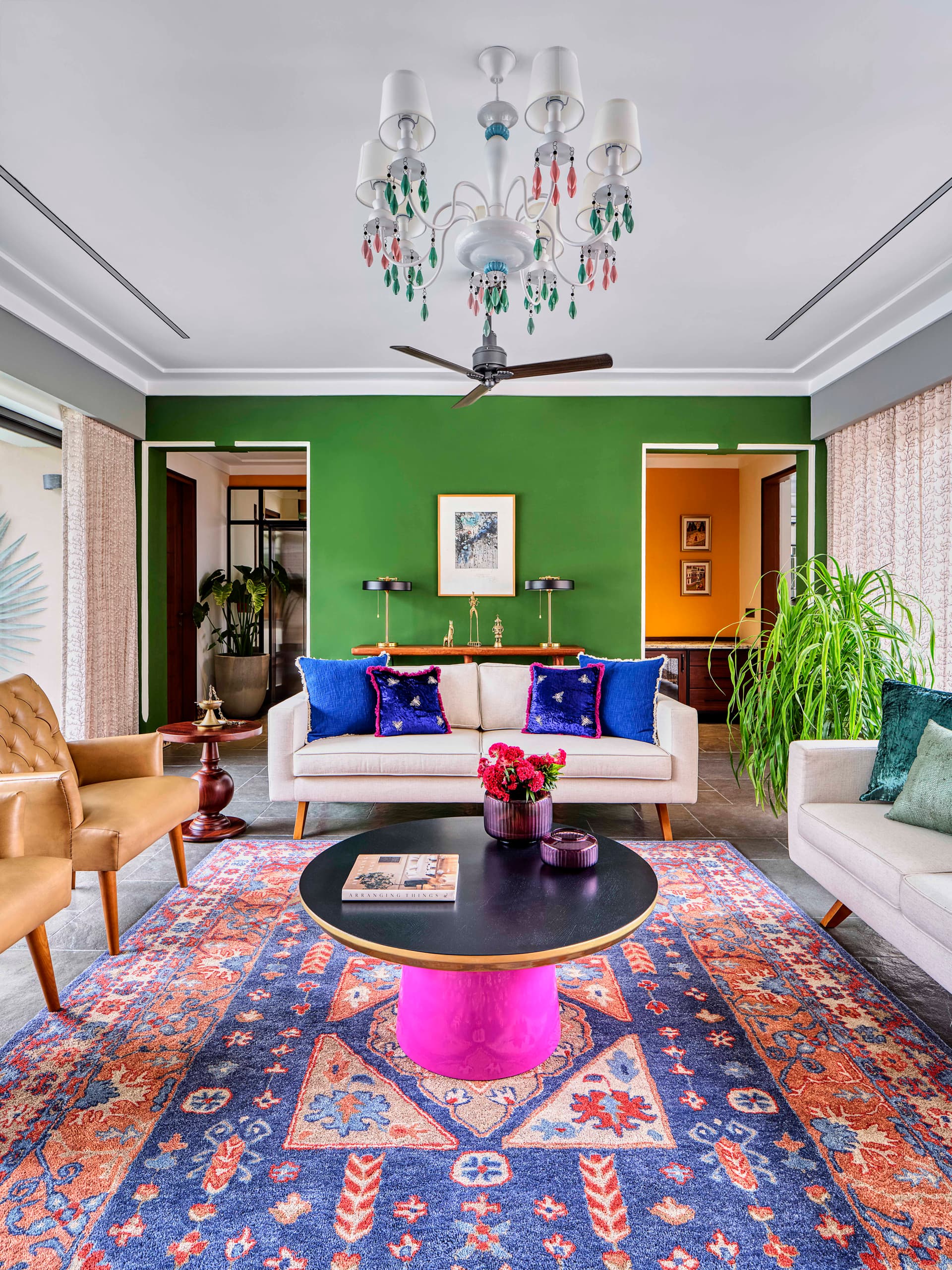 Eclectic design meets contemporary charm, blending bold hues with timeless textures for a strikingly refined atmosphere.